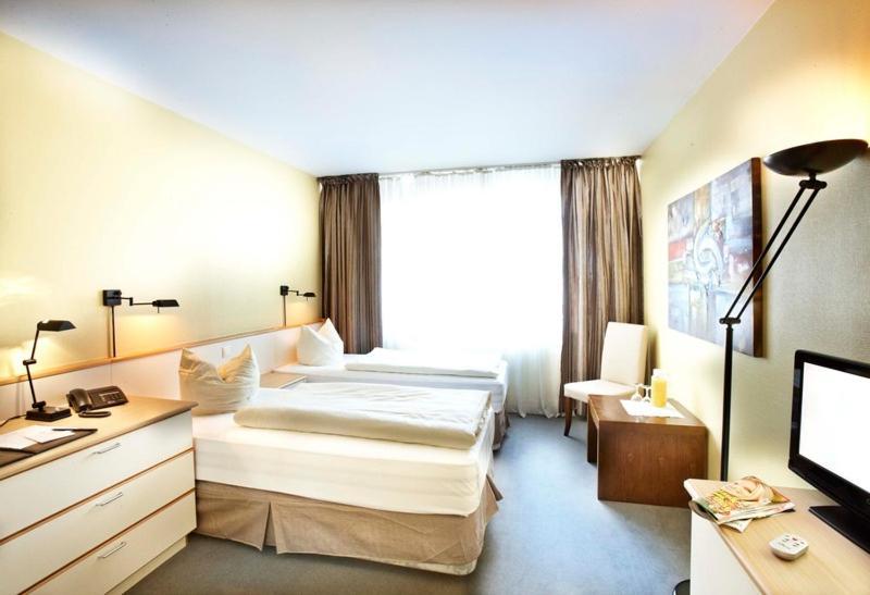 Hotel B99 Оффенбах Номер фото